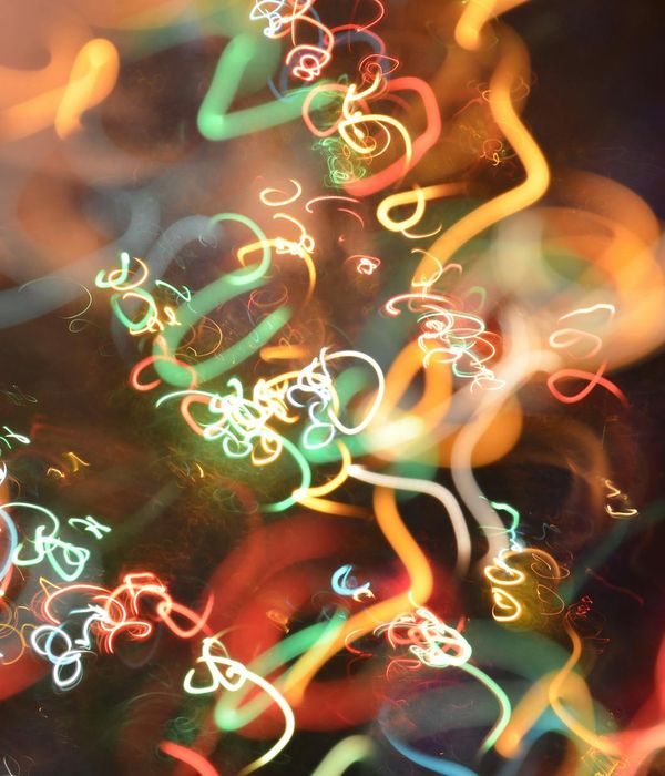 Abstract blue and green neon lines representing fluid movement